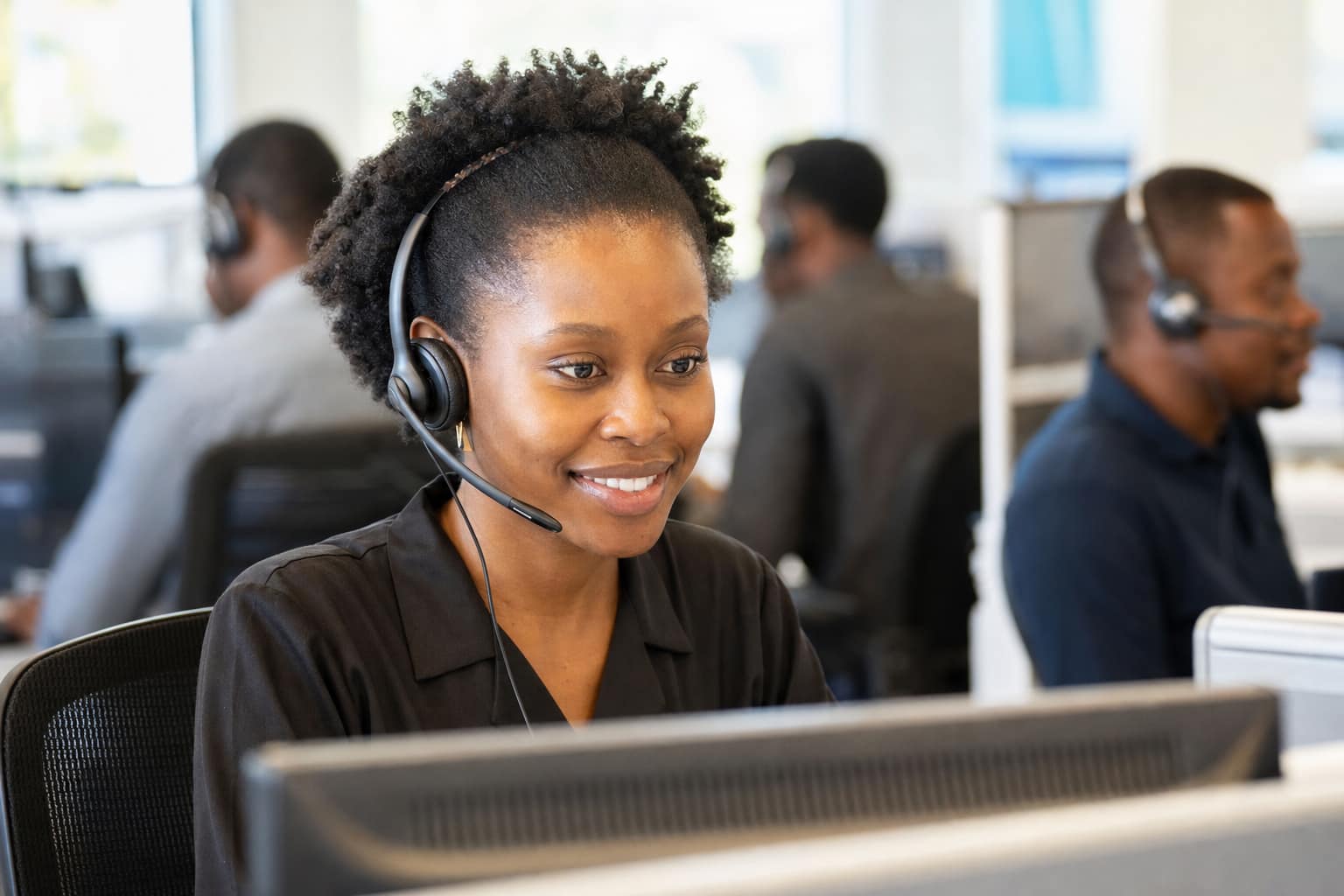 Confirmation Call Specialists GoodGoods confirmation call center specialist wearing a headset